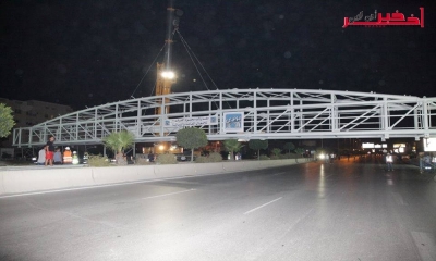 صور/ عين زغوان - العاصمة : تركيز منشأة علوية حديدية للمترجّلين على مستوى الطريق الوطنية 09